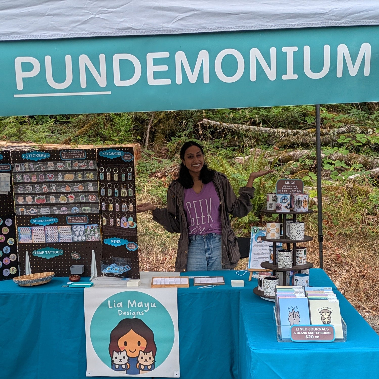 A photo of artist Sneha by her booth